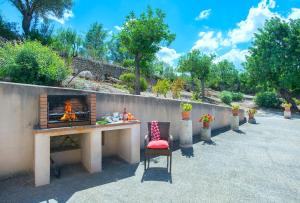 A balcony or terrace at Owl Booking Villa Siquier - Luxury Retreat with Mountain Views