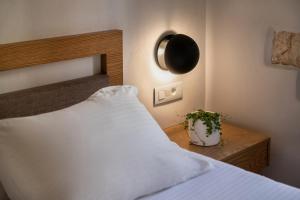 Postel nebo postele na pokoji v ubytování Hotel Off