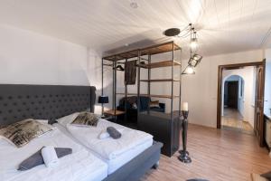 Postel nebo postele na pokoji v ubytování Hotel Porta Nigra