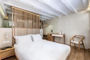 Postel nebo postele na pokoji v ubytování Hotel Off