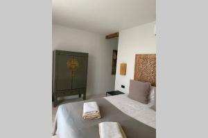 Een bed of bedden in een kamer bij Villa Bamboa-Curaçao