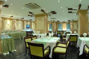 Veitingastaður eða matsölustaður á Al Muntazah Plaza Hotel