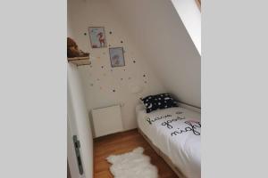 Llit o llits en una habitació de Apartman Winter Magic Divcibare