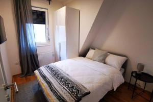 Llit o llits en una habitació de Apartman Winter Magic Divcibare