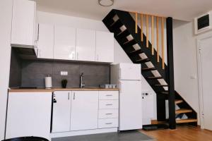 Kuhinja oz. manjša kuhinja v nastanitvi Apartman Winter Magic Divcibare