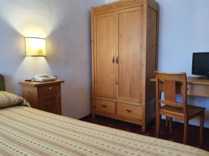 Postel nebo postele na pokoji v ubytování Villa Nencini
