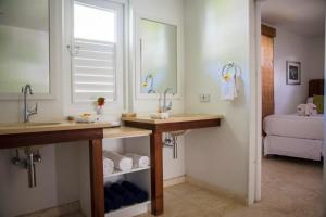 A bathroom at Bequia Plantation Hotel