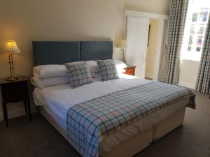 Posteľ alebo postele v izbe v ubytovaní Royal Artillery Cottage - Culzean Castle