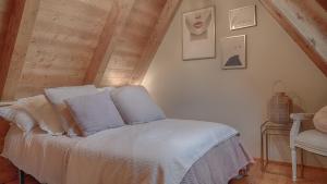 Postel nebo postele na pokoji v ubytování Saplan Real Estate SARRAERA