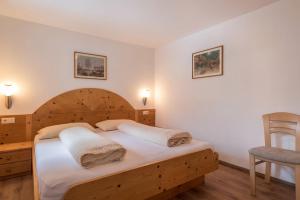 Llit o llits en una habitació de Apartment Santer Villa Erna