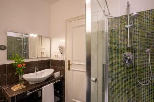 Koupelna v ubytování Vivaldi Luxury Rooms
