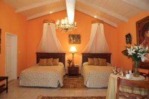 Postel nebo postele na pokoji v ubytování La Mirage Garden Hotel & Spa