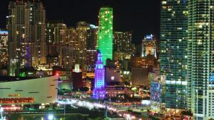 a city lit up at night with lights at Miami Sun Hotel - Downtown/Port of Miami in Miami