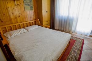Posteľ alebo postele v izbe v ubytovaní Residence Kristall appartamenti Solandra