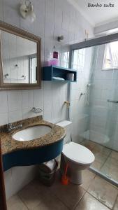 Ванна кімната в Apartamento Amplo Praia Grande Ubatuba JJ Mendes