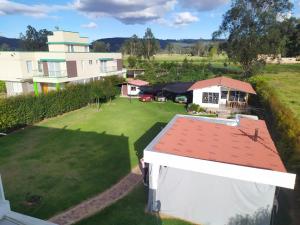 Zahrada ubytování Estadia independiente en el campo Boyacense + 2 fotografie