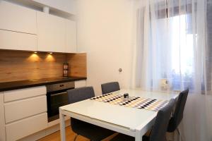 Kuchyňa alebo kuchynka v ubytovaní Apartment ARCHIE