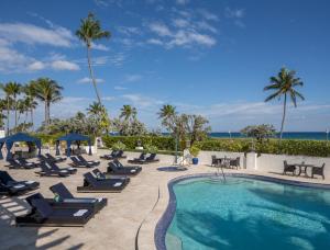 The swimming pool at or close to Opal Grand Oceanfront Resort & Spa