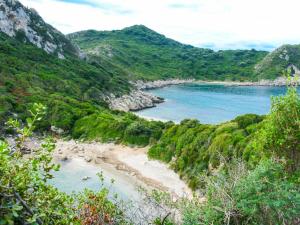 a view of a beach in a valley at The Wave in Sidari