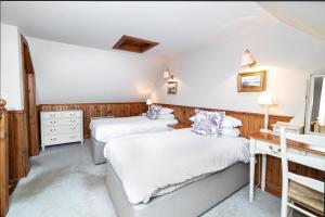 Letto o letti in una camera di Hotel Eilean Iarmain