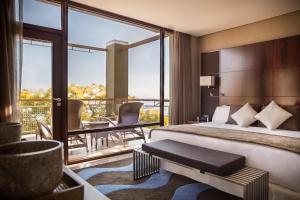 Llit o llits en una habitació de Hotel Miramar Barcelona GL