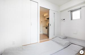Ein Bett oder Betten in einem Zimmer der Unterkunft Marvelous Kinshicho - Vacation STAY 11878v