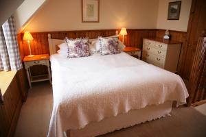 Letto o letti in una camera di Hotel Eilean Iarmain