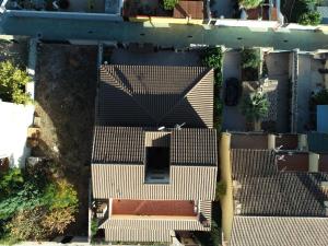 an overhead view of a house with a roof at Casa Peseta, Casa Rural in Vallada