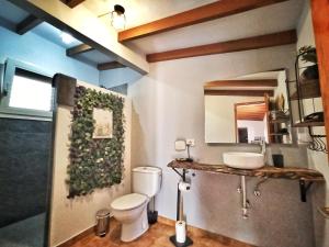Um banheiro em Casas Blancas - Suite 1