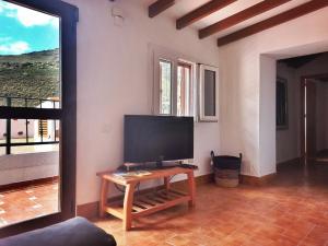 Μια τηλεόραση ή/και κέντρο ψυχαγωγίας στο Casas Blancas - Suite 1