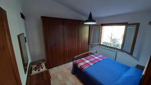 A bed or beds in a room at Casale di Nicolò