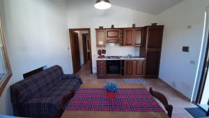 A kitchen or kitchenette at Casale di Nicolò