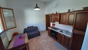 A kitchen or kitchenette at Casale di Nicolò