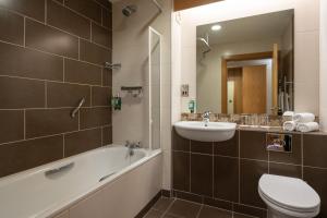 Koupelna v ubytování Belmore Court & Motel + 37 fotografií