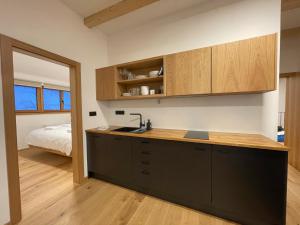 Kuchyňa alebo kuchynka v ubytovaní Apartmány Hacienda Boží Dar