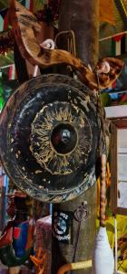 a large black plate with a wheel on it at Wooden Hut Koh Kood in Ko Kood
