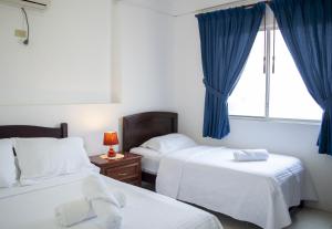 Ліжко або ліжка в номері Hotel Valeritos