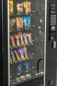 a vending machine filled with different types of chips at Bear Creek Inn Gatlinburg, TN in Gatlinburg
