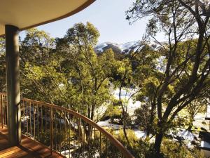 a balcony with a view of a snow covered mountain at Lhotsky 2 Bedroom apartment with balcony mountain views and BBQ in Thredbo