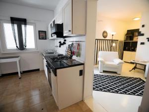 Kuchyň nebo kuchyňský kout v ubytování Apartment Eneja + 37 fotografií