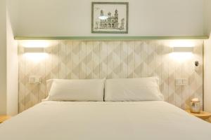 Кровать или кровати в номере Fantástico Apartamento cerca Playa