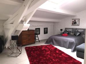 Postel nebo postele na pokoji v ubytování Clos de la Colombe