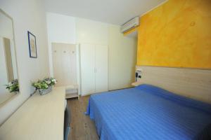 Postel nebo postele na pokoji v ubytování Hotel Mare