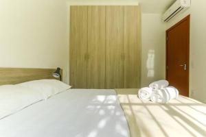 Cama o camas de una habitación en Modernos apartamentos para 4 ou 5 pessoas