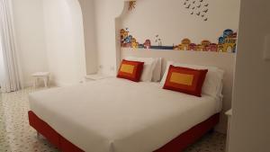 Łóżko lub łóżka w pokoju w obiekcie Hotel Le Terrazze