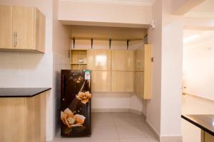 Kuchyň nebo kuchyňský kout v ubytování RAVIC HOMES NAKURU