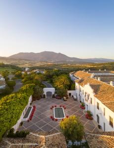 a large building with a view of the ocean at Finca Cortesin Hotel Golf & Spa in Casares