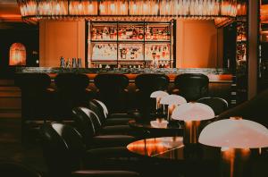 The lounge or bar area at The Mayfair Townhouse - an Iconic Luxury Hotel