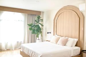 Voodi või voodid majutusasutuse Dream Nimman Apartment toas