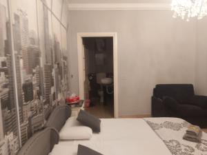 A bed or beds in a room at B&B La Corte Dei Samidagi